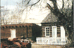 Hand hewn log cabin.